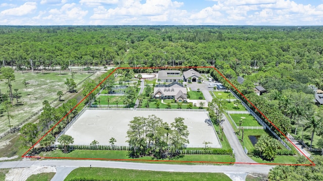 1464 Stallion Dr, Loxahatchee, FL 33470 - aerial overview of property's location featuring a heavily wooded area and property parcel outlined