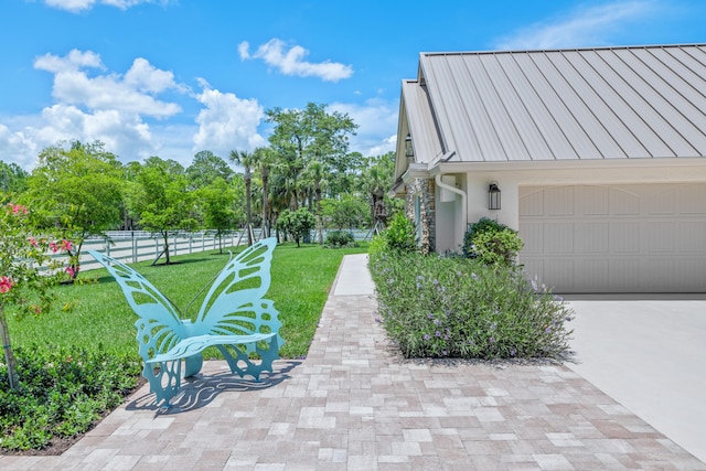 view of patio / terrace with a garage