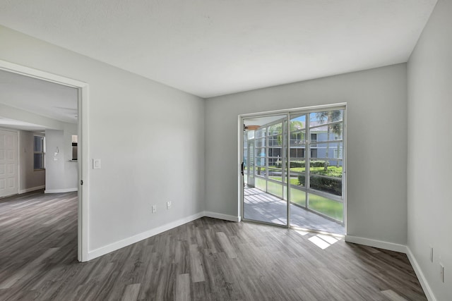 empty room featuring hardwood / wood-style flooring