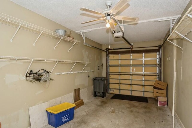 garage with a garage door opener and ceiling fan