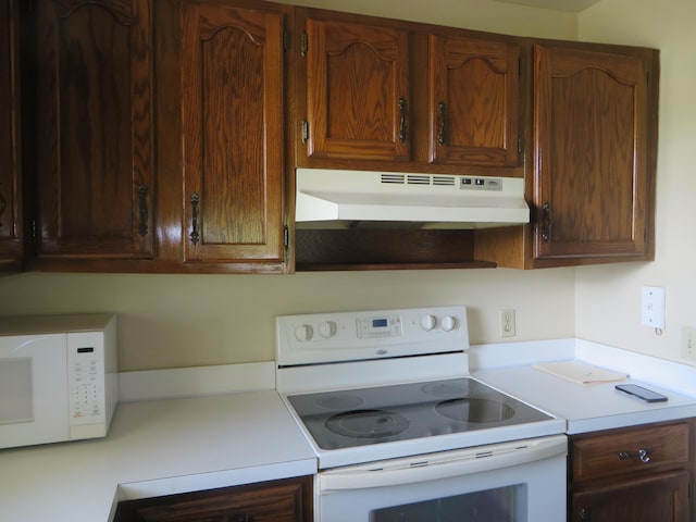 kitchen featuring white appliances