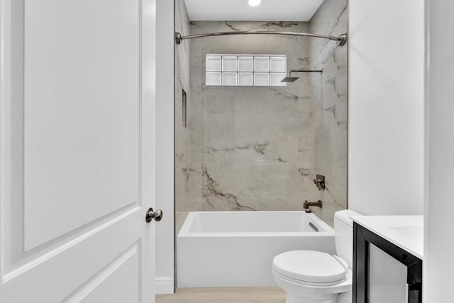 full bathroom featuring vanity, toilet, and tiled shower / bath