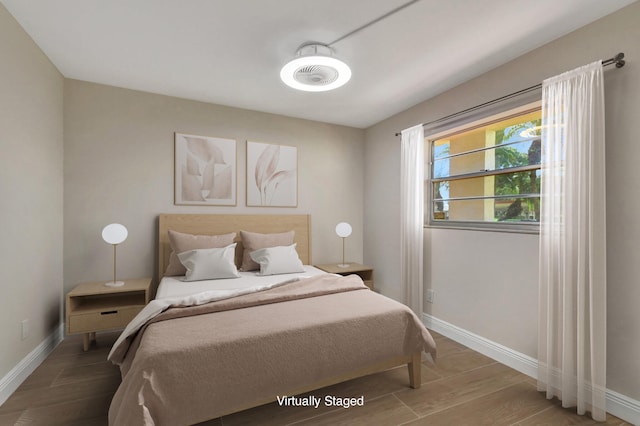 bedroom featuring hardwood / wood-style floors