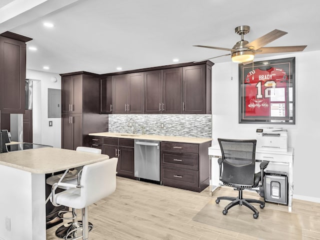 kitchen with sink, tasteful backsplash, ceiling fan, stainless steel dishwasher, and light wood-type flooring