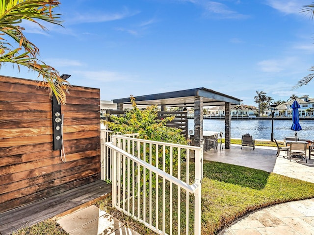 exterior space with a water view