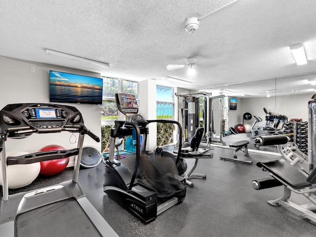 2200 S Ocean Blvd Unit 806, Delray Beach, FL 33483 - exercise room featuring a textured ceiling