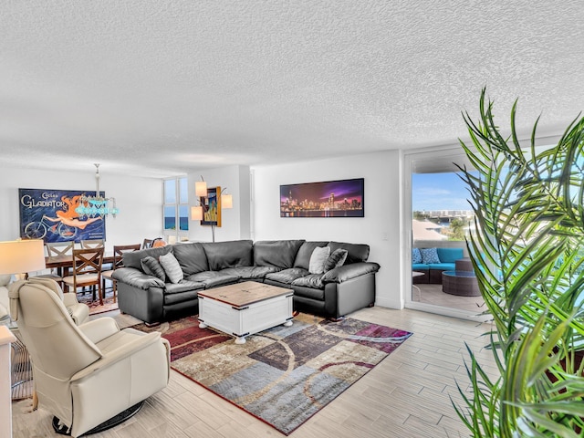 2200 S Ocean Blvd Unit 806, Delray Beach, FL 33483 - living room with a textured ceiling and wood finished floors