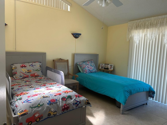 bedroom with ceiling fan and vaulted ceiling