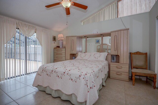 bathroom featuring vanity, tile patterned flooring, and toilet