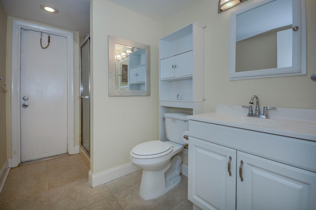 full bathroom featuring tile patterned flooring, toilet, vanity, baseboards, and a shower stall