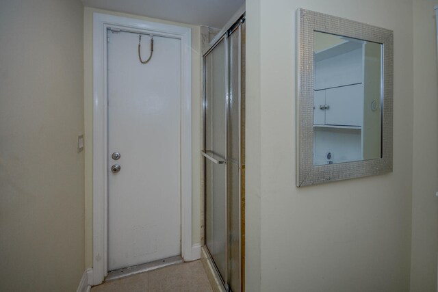 full bathroom with vanity, shower / tub combo, toilet, and tile patterned floors