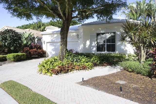 view of front of home with a garage