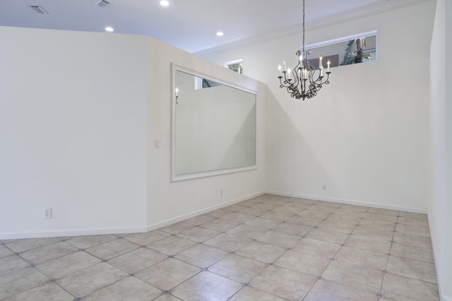 unfurnished dining area featuring a chandelier and ornamental molding