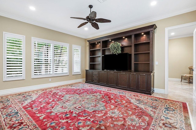 living room with ceiling fan and ornamental molding