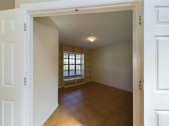 view of tiled spare room