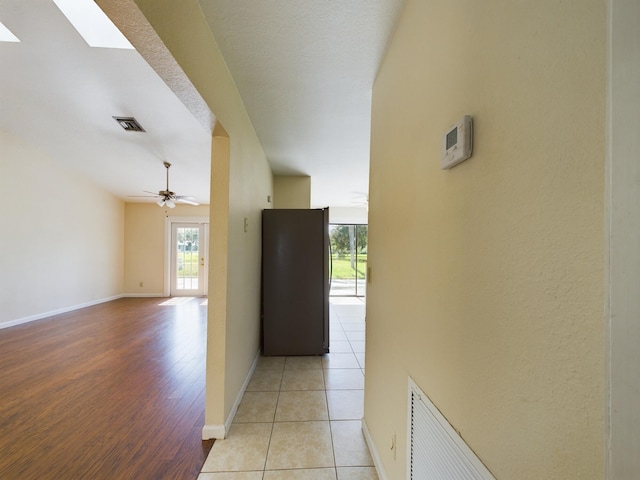 hallway featuring light hardwood / wood-style floors