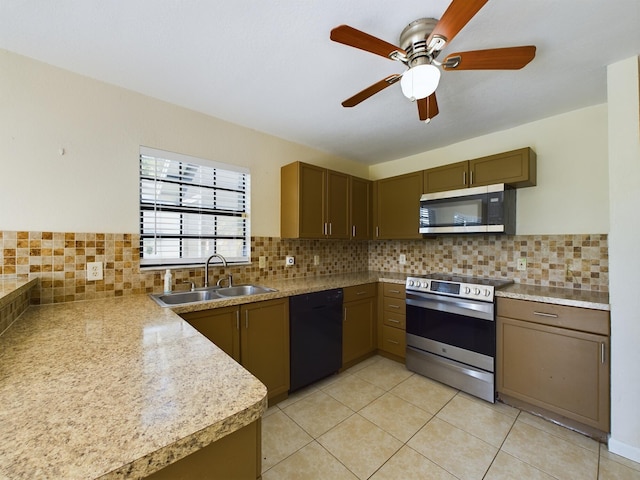 kitchen with decorative backsplash, light tile patterned floors, ceiling fan, sink, and stainless steel appliances