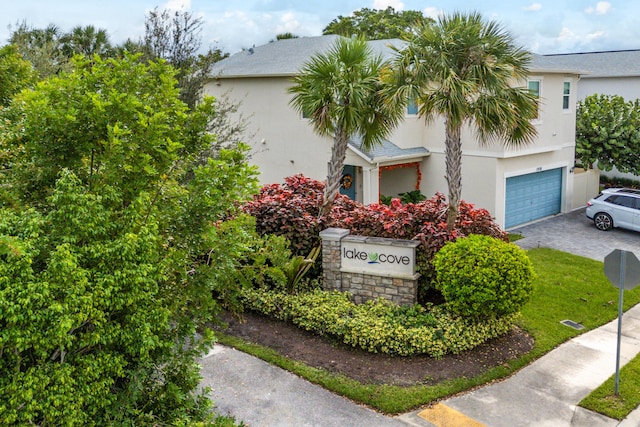 1822 Lake Cove Dr, Lake Worth Beach, FL 33460 - community sign with a garage and driveway