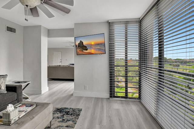 interior space featuring plenty of natural light and light hardwood / wood-style floors