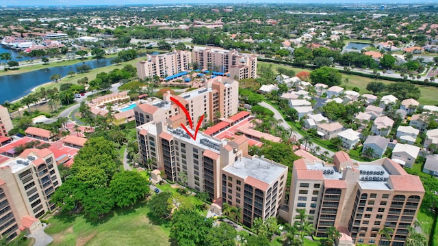 drone / aerial view with a water view