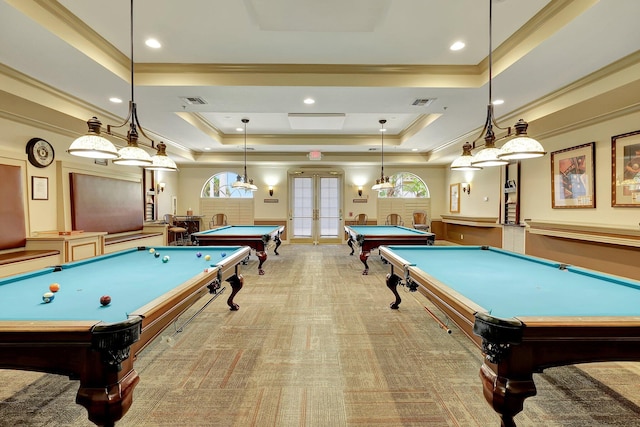 game room featuring french doors, crown molding, a tray ceiling, and light colored carpet