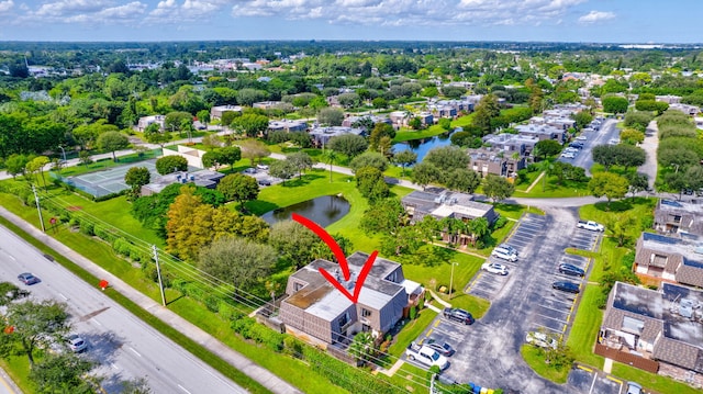 aerial view featuring a water view and a residential view