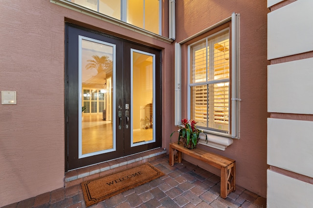 doorway to property featuring french doors