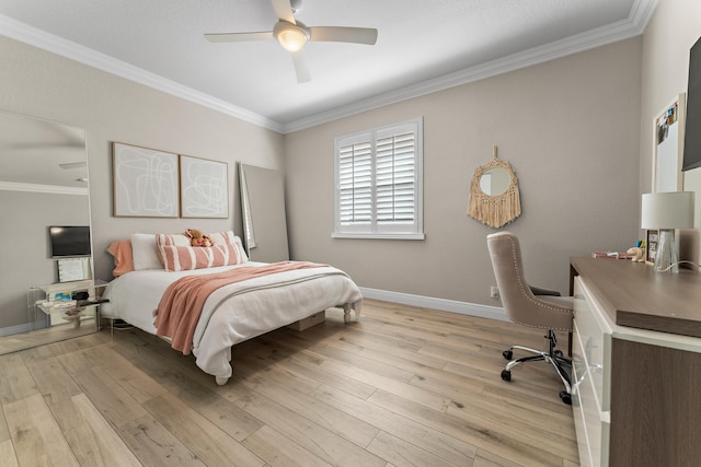 bedroom featuring ceiling fan, light hardwood / wood-style flooring, and ornamental molding