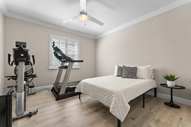 bedroom with ceiling fan, light hardwood / wood-style floors, and ornamental molding