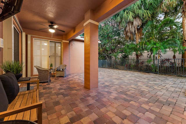 view of patio with ceiling fan