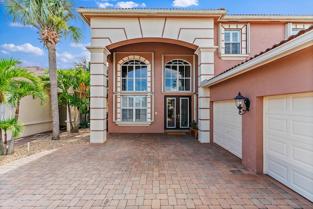 doorway to property featuring french doors