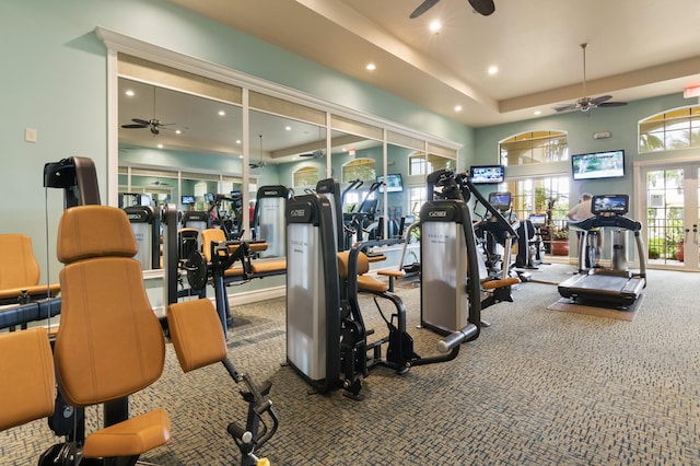 exercise room with carpet flooring, ceiling fan, and french doors