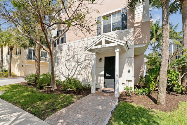 view of front of home with a garage