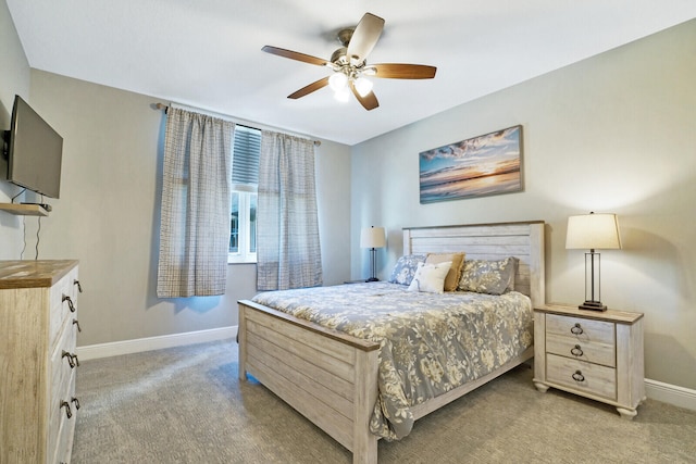 bedroom featuring ceiling fan and light colored carpet