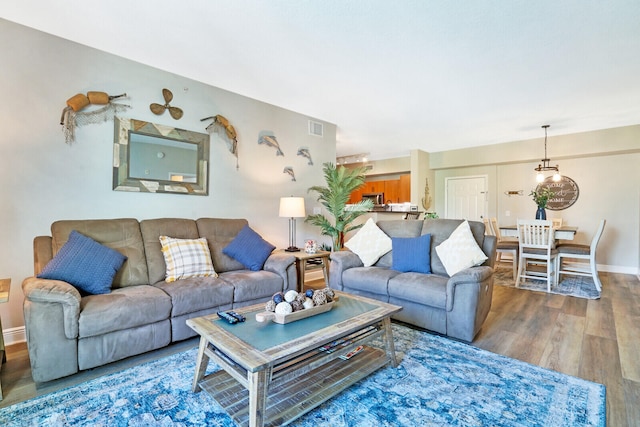 living room with hardwood / wood-style floors