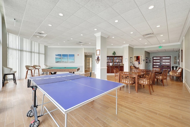 playroom with light hardwood / wood-style floors, crown molding, and billiards