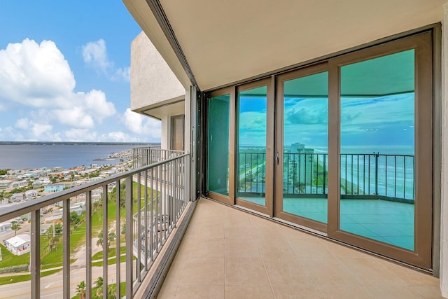 balcony featuring a water view