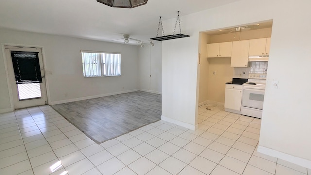 kitchen with ceiling fan, white cabinets, light hardwood / wood-style flooring, white range with electric cooktop, and decorative backsplash