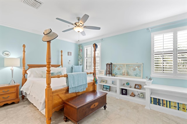 bedroom with ornamental molding and ceiling fan