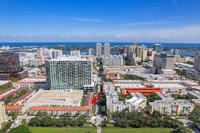 birds eye view of property featuring a water view