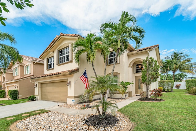 mediterranean / spanish-style house featuring a front lawn and a garage