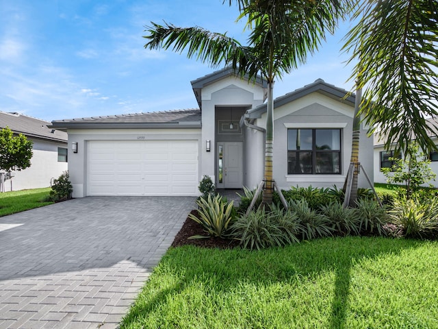 view of front of home with a garage