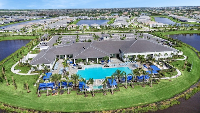 view of swimming pool with a water view