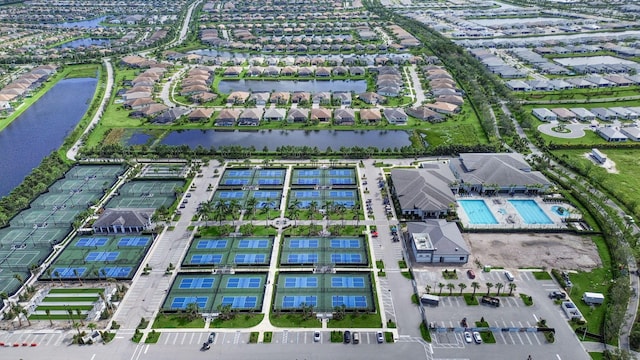 birds eye view of property featuring a water view