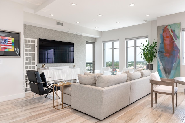 living room with light hardwood / wood-style flooring