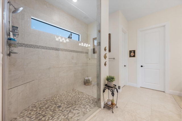 bathroom with a shower with shower door