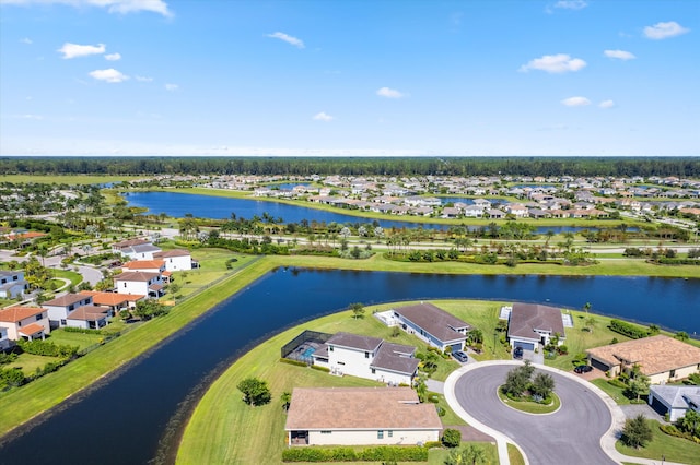 drone / aerial view with a water view