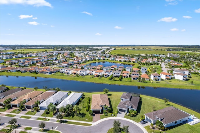 drone / aerial view featuring a water view