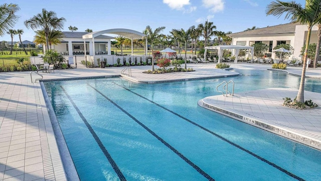 view of swimming pool featuring a patio area