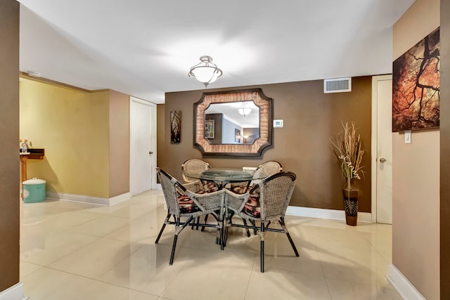 dining room featuring light tile patterned floors